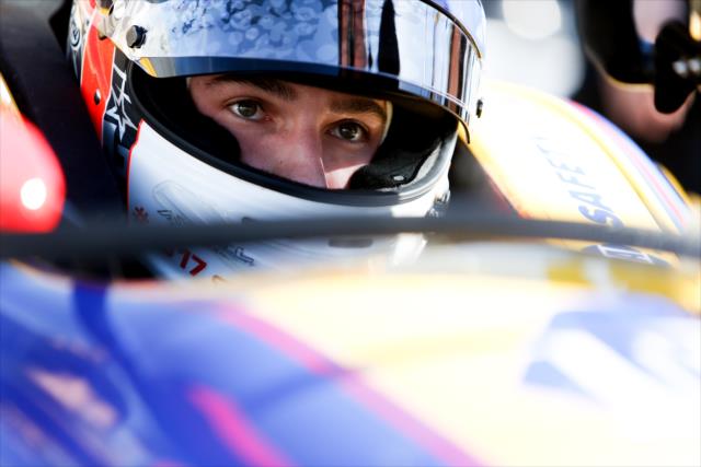 Alexander Rossi sits in his No. 27 NAPA Auto Parts Honda on pit lane during the afternoon open test session at ISM Raceway -- Photo by: Joe Skibinski