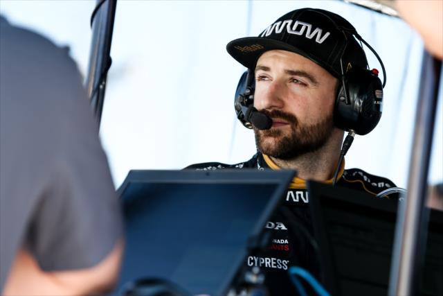 James Hinchcliffe watches track activity from pit lane during the afternoon open test session at ISM Raceway -- Photo by: Joe Skibinski
