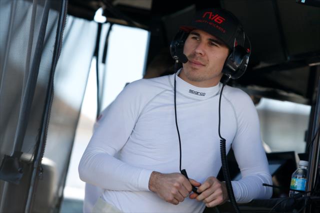 Robert Wickens watches track activity from his pit stand during the afternoon open test session at ISM Raceway -- Photo by: Joe Skibinski