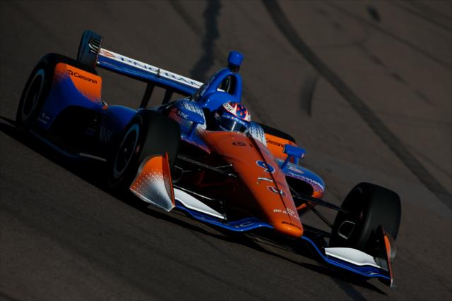 Scott Dixon dives into Turn 1 during the afternoon open test session at ISM Raceway -- Photo by: Joe Skibinski