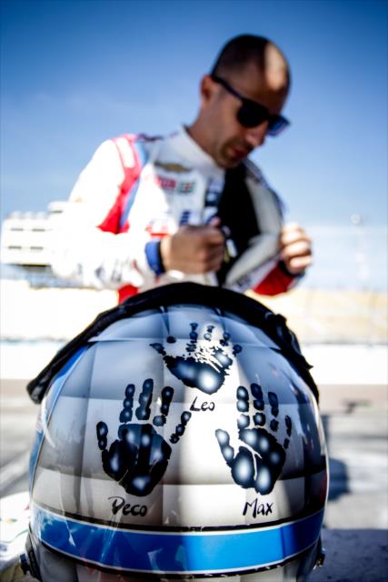 Tony Kanaan gets ready along pit lane prior to the start of the first afternoon open test session at ISM Raceway -- Photo by: Shawn Gritzmacher
