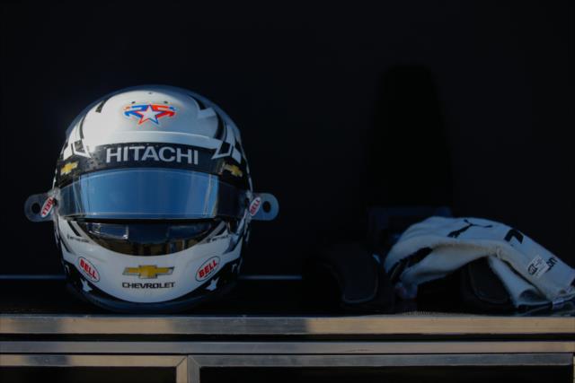The helmet and gloves of Josef Newgarden sit along pit lane prior to the start of the afternoon open test session at ISM Raceway -- Photo by: Shawn Gritzmacher