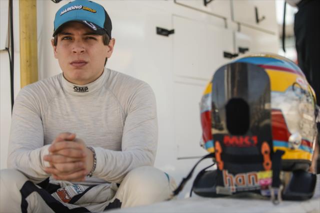 Gabby Chaves waits in his pit stand prior to the start of the afternoon open test session at ISM Raceway -- Photo by: Shawn Gritzmacher