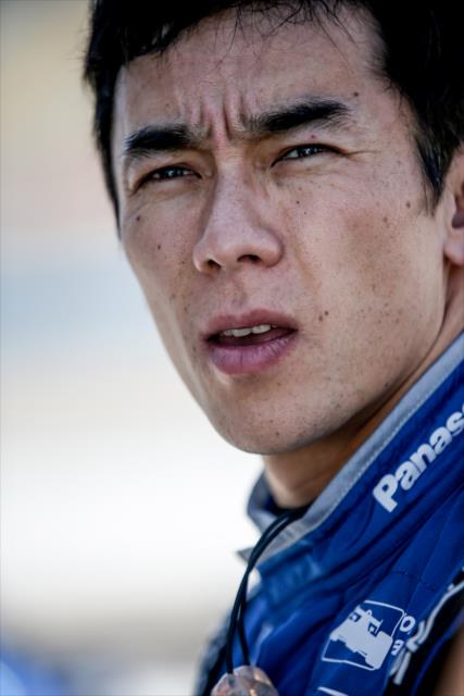 Takuma Sato watches from pit lane during the afternoon open test session at ISM Raceway -- Photo by: Shawn Gritzmacher