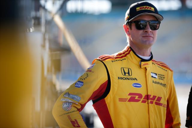 Ryan Hunter-Reay watches track activity from pit lane during the afternoon open test session at ISM Raceway -- Photo by: Shawn Gritzmacher