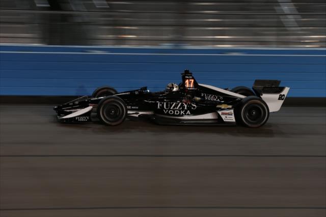 Ed Carpenter streaks through Turn 2 during the evening open test session at ISM Raceway -- Photo by: Chris Jones