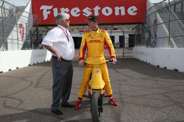 Ryan Hunter-Reay chats with INDYCAR CEO Mark Miles in the paddock prior to the start of the afternoon open test session at ISM Raceway -- Photo by: Chris Jones