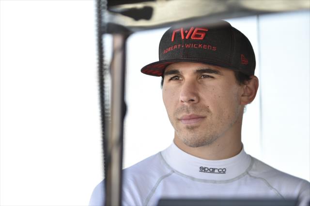 Robert Wickens looks down pit lane prior to the start of the afternoon open test session at ISM Raceway -- Photo by: Chris Owens