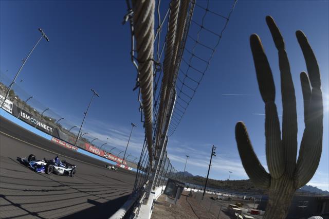 Takuma Sato rolls down the backstretch during the afternoon open test session at ISM Raceway -- Photo by: Chris Owens