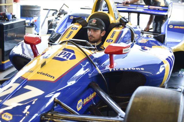 Alexander Rossi sits in his No. 27 NAPA Auto Parts Honda in the ISM Raceway garages -- Photo by: Chris Owens