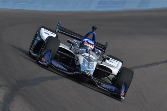 Takuma Sato starts his entrance into Turn 1 during the afternoon test session at ISM Raceway -- Photo by: Chris Owens