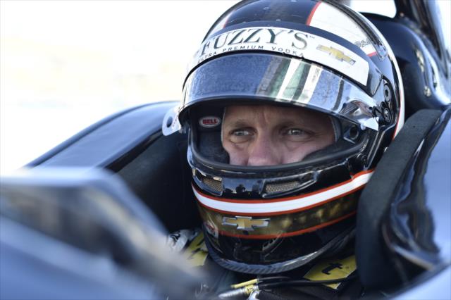 Ed Carpenter sits in his No. 20 Fuzzy's Vodka Chevrolet on pit lane prior to the start of the afternoon open test session at ISM Raceway -- Photo by: Chris Owens
