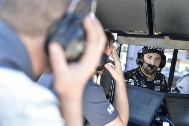James Hinchcliffe chats with his engineers during the afternoon open test session at ISM Raceway -- Photo by: Chris Owens