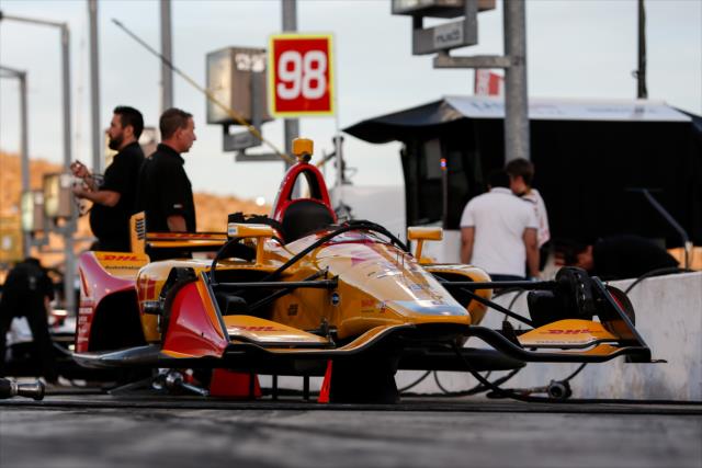 The No. 28 DHL Honda of Ryan Hunter-Reay sits on pit lane prior to the start of the evening open test session at ISM Raceway -- Photo by: Joe Skibinski