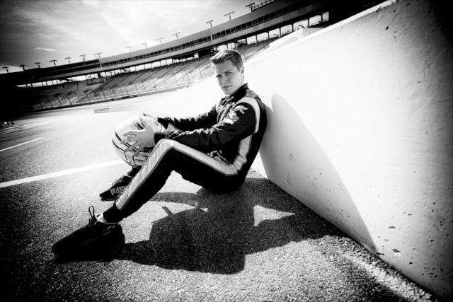 Josef Newgarden sits along pit lane prior to the afternoon test session at ISM Raceway -- Photo by: Shawn Gritzmacher