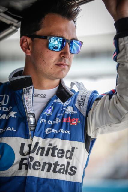 Graham Rahal looks down pit lane from his pitstand prior to the start of the evening test session at ISM Raceway -- Photo by: Shawn Gritzmacher