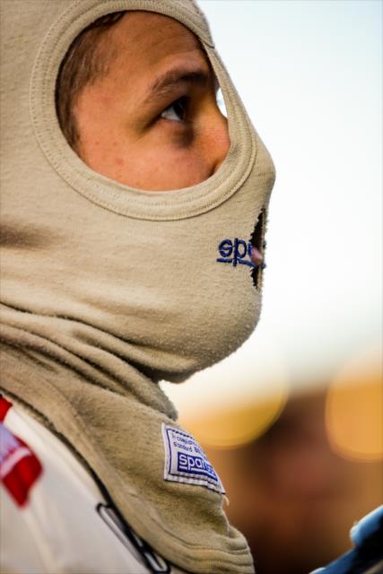 Marco Andretti gets prepped along pit lane during the evening test session at ISM Raceway -- Photo by: Shawn Gritzmacher