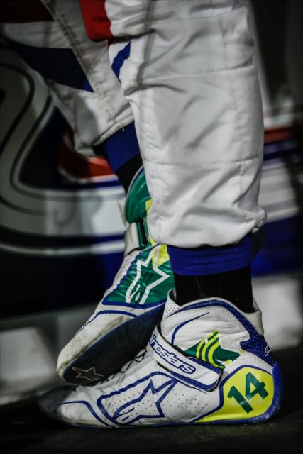 The shoes of Tony Kanaan ready to go to work during the evening test session at ISM Raceway -- Photo by: Shawn Gritzmacher