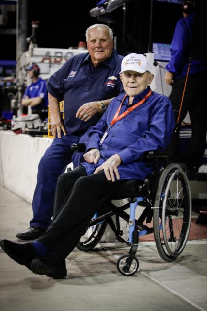 A.J. Foyt and Gen. Chuck Yeager watch track activity from pit lane during the evening test session at ISM Raceway -- Photo by: Shawn Gritzmacher