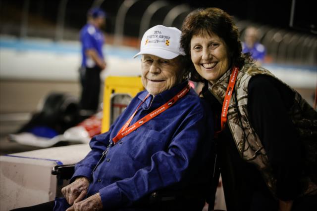 Gen. Chuck Yeager and wife Victoria watch track activity from the evening test at ISM Raceway -- Photo by: Shawn Gritzmacher