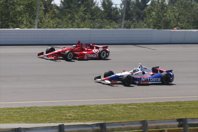 Tony Kanaan and Ryan Briscoe go two-wide during the Pocono INDYCAR 500 at Pocono Raceway -- Photo by: Chris Jones