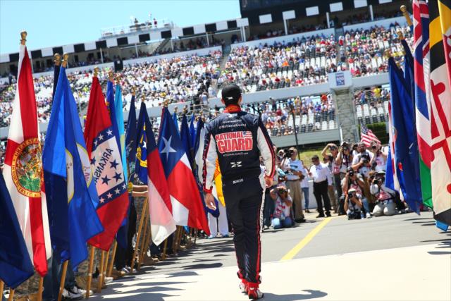 Graham Rahal walks out to the grid during pre-race activities for the Pocono INDYCAR 500 -- Photo by: Chris Jones