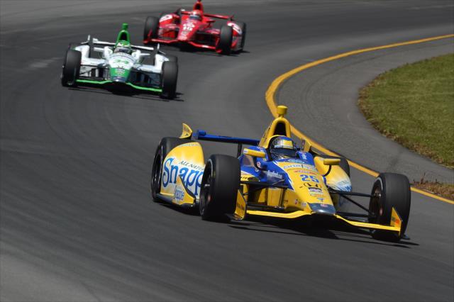 Marco Andretti leads Carlos Munoz and Tony Kanaan -- Photo by: Chris Owens