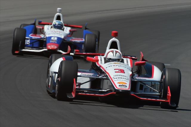 Helio Castroneves leads Ryan Briscoe -- Photo by: Chris Owens