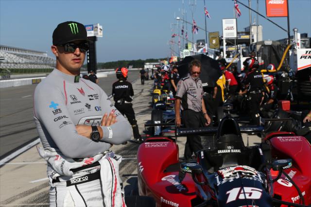 Graham Rahal waits along pit lane prior to practice for the ABC Supply 500 at Ponono Raceway -- Photo by: Chris Jones