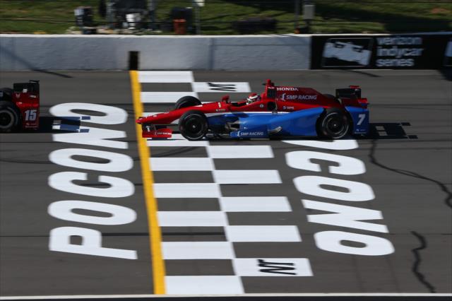 Mikhail Aleshin flashes across the start/finish line during practice for the ABC Supply 500 at Pocono Raceway -- Photo by: Chris Jones