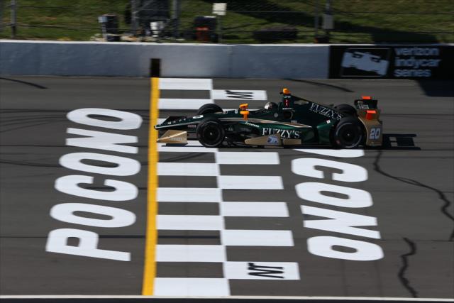 Ed Carpenter flashes across the start/finish line during practice for the ABC Supply 500 at Pocono Raceway -- Photo by: Chris Jones