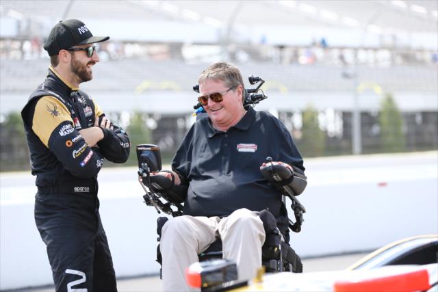 James Hinchcliffe chats with team owner Sam Schmidt along pit lane prior to his qualification attempt for the ABC Supply 500 at Pocono Raceway -- Photo by: Chris Jones