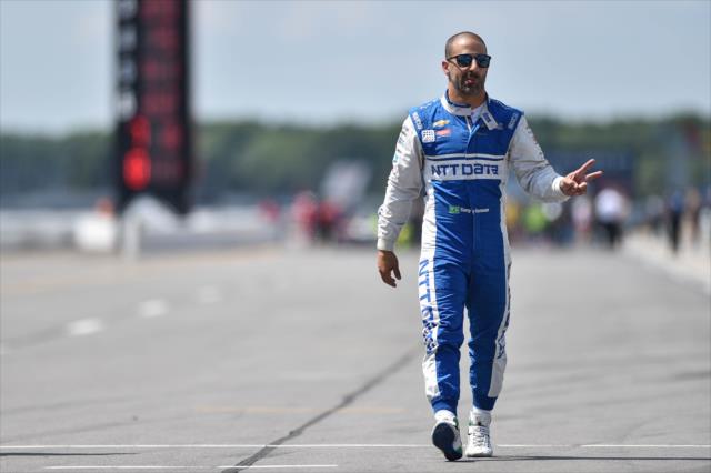 Tony Kanaan walks pit lane prior to practice for the ABC Supply 500 at Pocono Raceway -- Photo by: Chris Owens