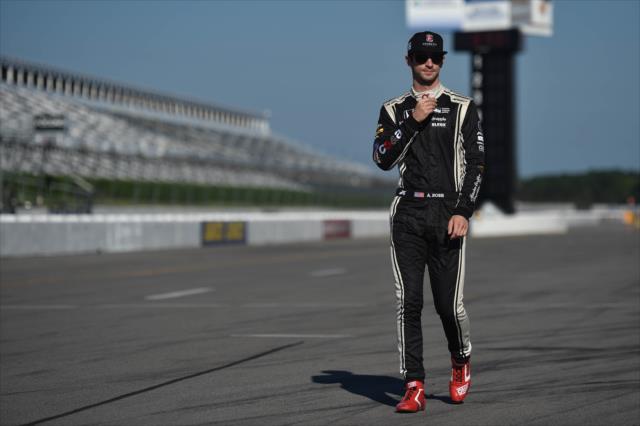 Alexander Rossi walks pit lane prior to practice for the ABC Supply 500 at Pocono Raceway -- Photo by: Chris Owens