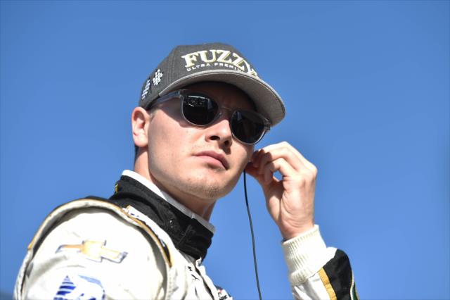 Josef Newgarden looks down pit lane prior to practice for the ABC Supply 500 at Pocono Raceway -- Photo by: Chris Owens