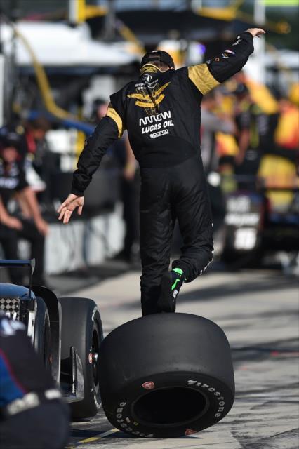 James Hinchcliffe with some artistic gymnastics on pit lane prior to the evening practice for the ABC Supply 500 at Pocono Raceway -- Photo by: Chris Owens