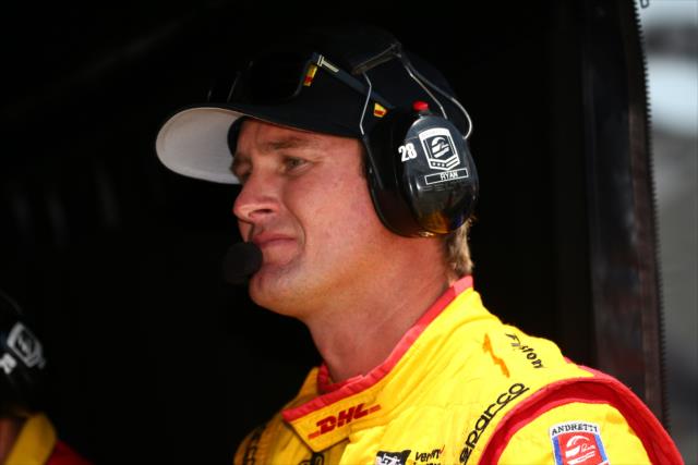 Ryan Hunter-Reay monitors the first part of qualifications from his pit stand at Pocono Raceway -- Photo by: Bret Kelley