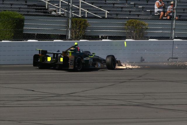 Ed Carpenter makes contact with the Turn 3 wall during practice for the ABC Supply 500 at Pocono Raceway -- Photo by: Bret Kelley