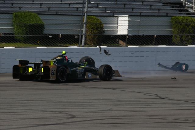 Ed Carpenter makes contact exiting Turn 3 during practice for the ABC Supply 500 at Pocono Raceway -- Photo by: Bret Kelley
