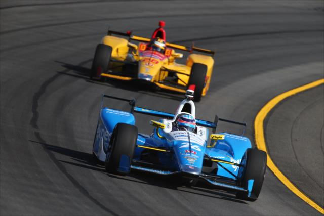 Teammates Takuma Sato and Ryan Hunter-Reay race through Turn 3 during practice for the ABC Supply 500 at Pocono Raceway -- Photo by: Bret Kelley