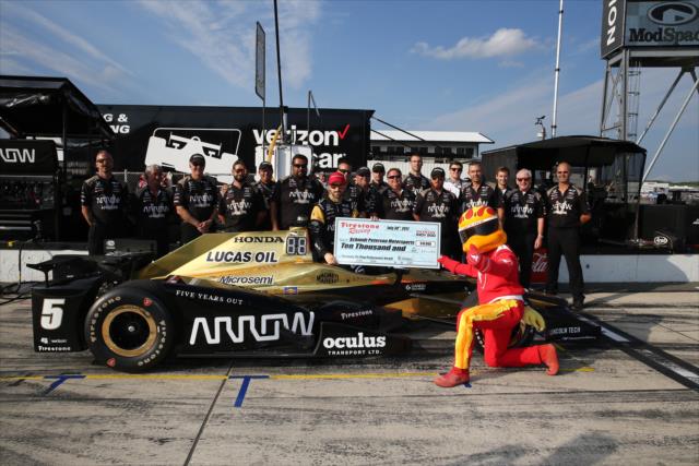 James Hinchcliffe accepts the Firestone Pit Stop Performance award on behalf of Schmidt Peterson Motorsports for their performance at Mid-Ohio -- Photo by: Chris Jones