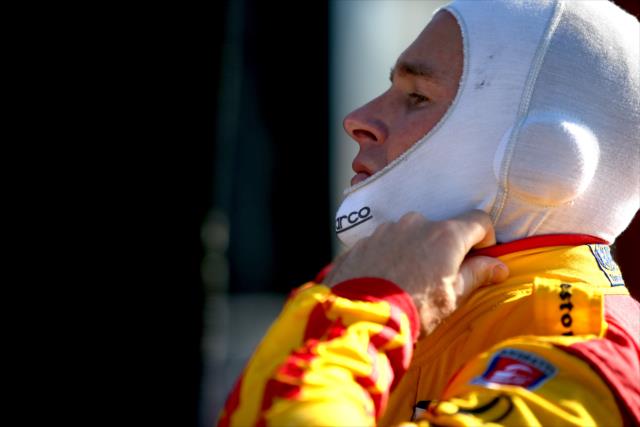Ryan Hunter-Reay adjusts his balaclava on pit lane prior to practice for the ABC Supply 500 at Pocono Raceway -- Photo by: Chris Jones