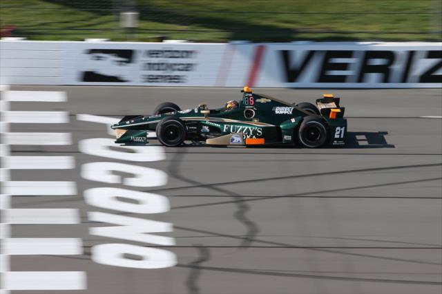 JR Hildebrand streaks across the start/finish line during practice for the ABC Supply 500 at Pocono Raceway -- Photo by: Chris Jones