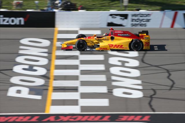 Ryan Hunter-Reay flashes across the start/finish line during practice for the ABC Supply 500 at Pocono Raceway -- Photo by: Chris Jones