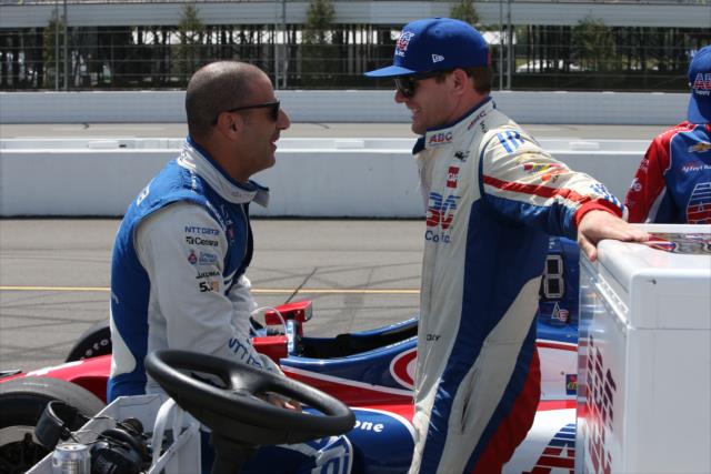 Tony Kanaan and Conor Daly chat along pit lane prior to qualifications for the ABC Supply 500 at Pocono Raceway -- Photo by: Chris Jones