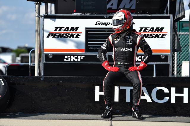 Helio Castroneves sits along pit lane prior to practice for the ABC Supply 500 at Pocono Raceway -- Photo by: Chris Owens