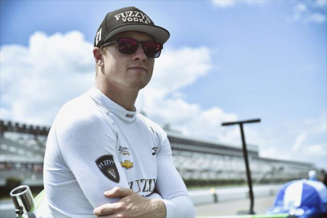 Spencer Pigot waits along pit lane prior to practice for the ABC Supply 500 at Pocono Raceway -- Photo by: Chris Owens