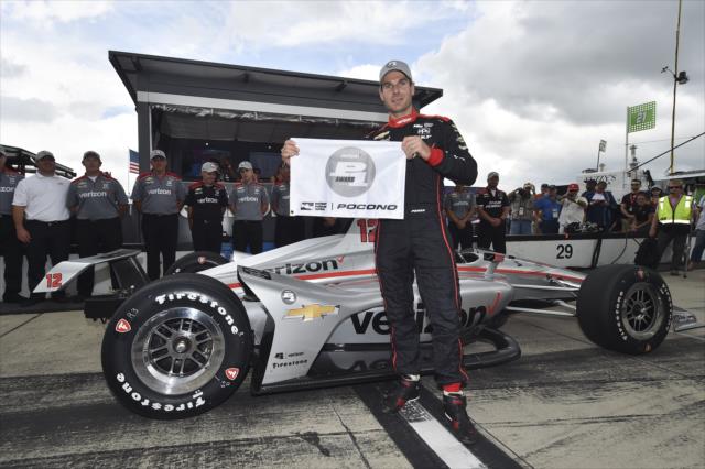 Will Power with the Verizon P1 Award flag on pit lane after winning the pole position for the ABC Supply 500 at Pocono Raceway -- Photo by: Chris Owens