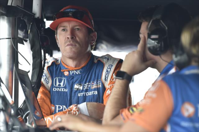 Scott Dixon watches qualification attempts from his pit stand prior to his qualification attempt for the ABC Supply 500 at Pocono Raceway -- Photo by: Chris Owens