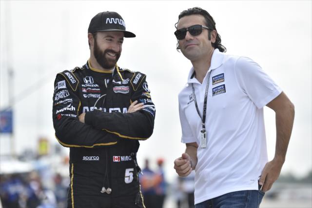 James Hinchcliffe chats with Dario Franchitti along pit lane prior to his qualification attempt for the ABC Supply 500 at Pocono Raceway -- Photo by: Chris Owens